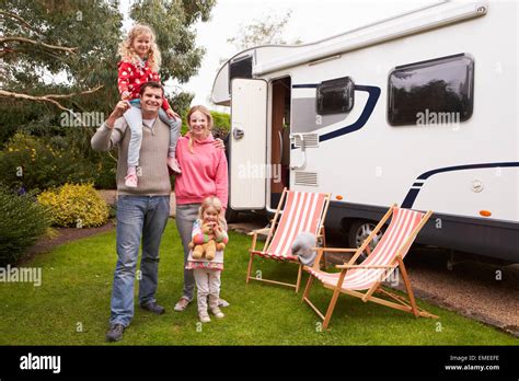 Portrait Of Family Enjoying Camping Holiday In Camper Van Stock Photo ...