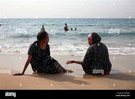 Muslim women chat on a beach in Berbera, Somaliland, Somalia Stock ...