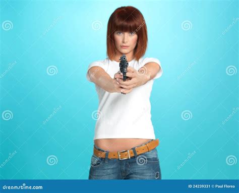 Pretty Young Woman Pointing the Gun Stock Image - Image of background ...