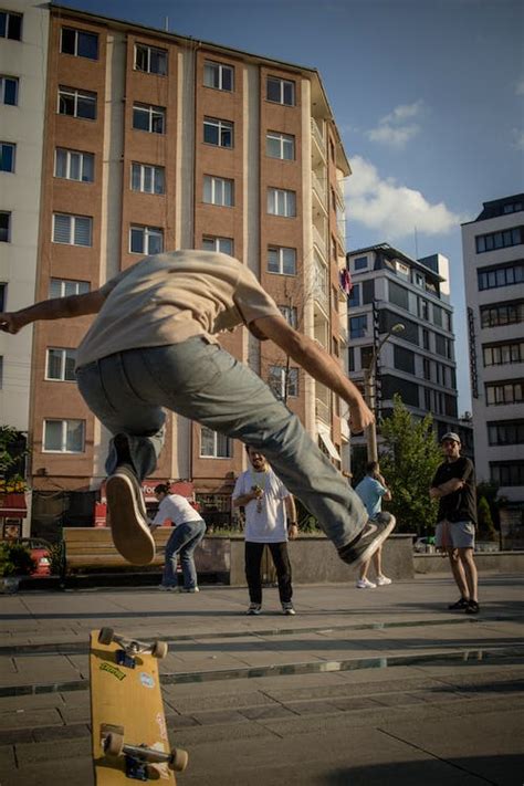 A Skater Doing Tricks on a Public Park · Free Stock Photo