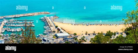 Panoramic view of waterfront with marina and beach in Sidi Bou Said ...