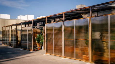 Part Office and cactus store design greenhouse with tinted ...