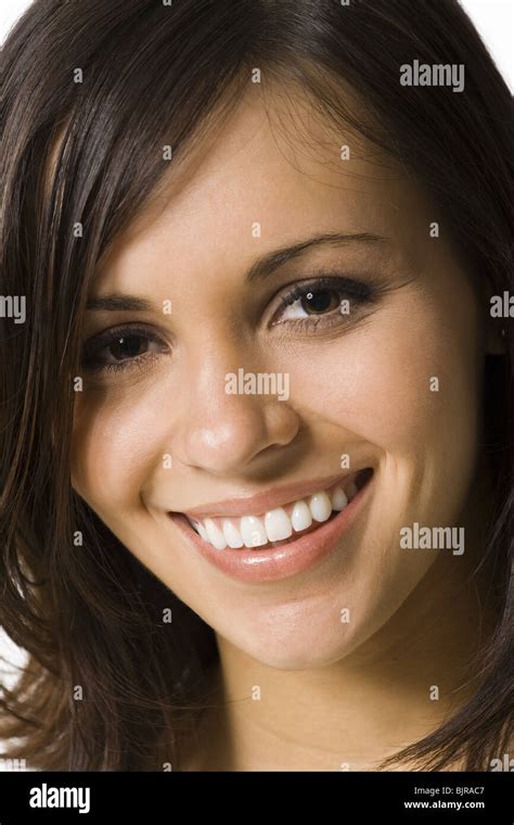 Woman posing and smiling Stock Photo - Alamy