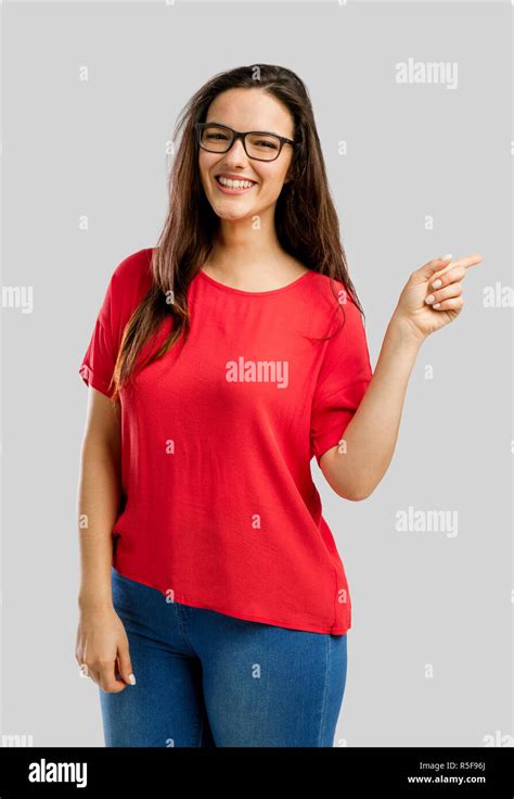 Happy woman pointing to the camera Stock Photo - Alamy