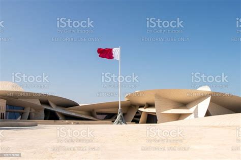 Qatari Flag And Qatar National Museum In Doha Qatar Stock Photo ...