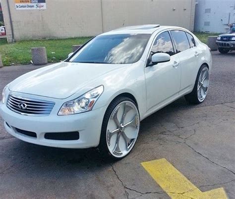 Ace-1: Memphis White Infiniti G37 on 26" Davin Spinners