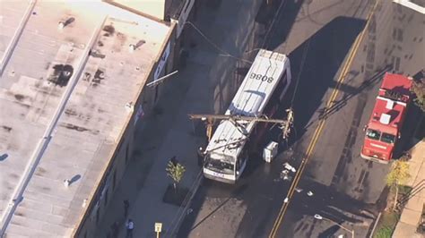 Hijacked New York City bus crashes into utility pole