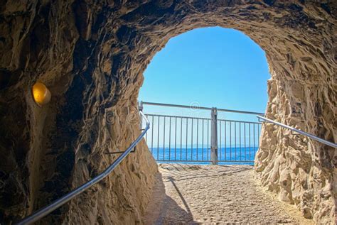 Cave exit stock photo. Image of round, clouds, entrance - 1319460