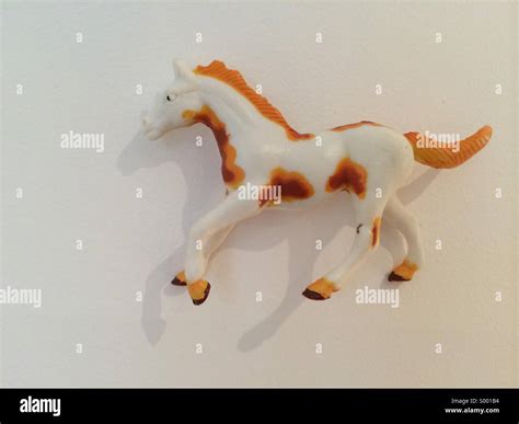 Plastic toy horse figure Stock Photo - Alamy