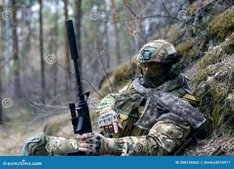 Concept of Modern Warfare - a Mercenary Soldier is Resting after a ...