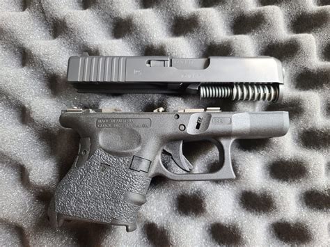 Glock 26 Gen 4 with 6 magazines, holster, and accessories — Caza Guns