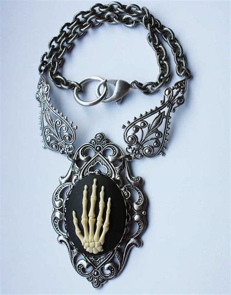 Skeleton hand necklace by Pinkabsinthe on DeviantArt