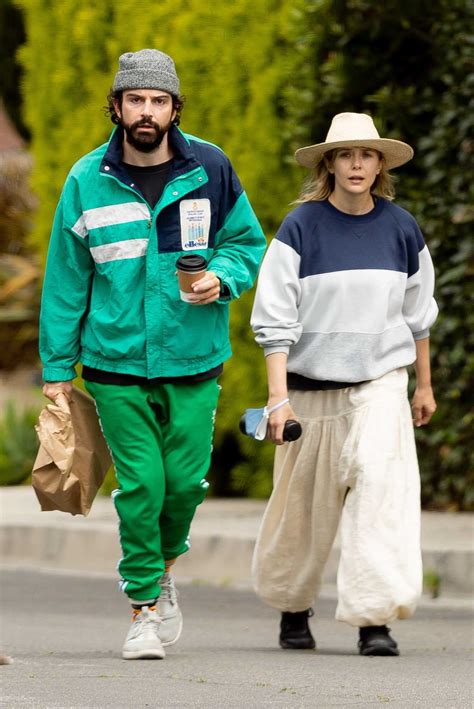 Elizabeth Olsen in a Beige Straw Hat Was Seen Out with Her Husband ...