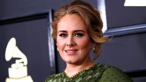 Adele responds to controversy sparked by photo of her wearing Bantu knots