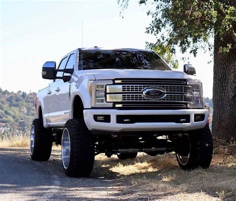 lifted white truck ford - Kieth Ellison