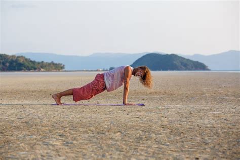 Man is Doing Yoga on the Beach Stock Image - Image of freedom ...