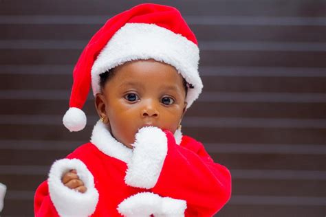 Baby Wearing Santa Costume · Free Stock Photo