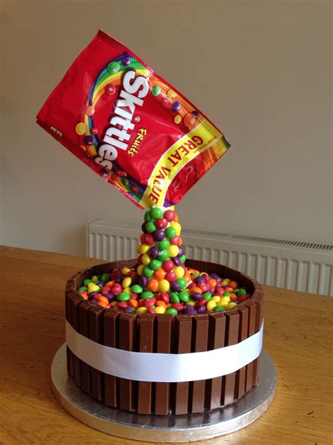 Skittles cake for sons birthday. Used an upside down ice cream cone ...