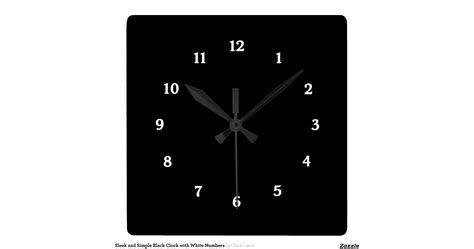 sleek_and_simple_black_clock_with_white_numbers ...