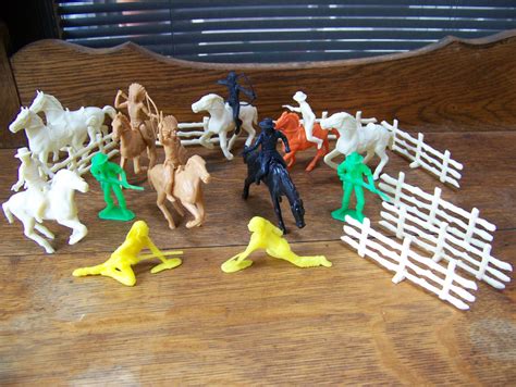 Vintage Plastic Toy Horses Cowboys and Indians and fence.