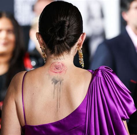 Selena Gomez and Cara Delevingne's Matching Rose Neck Tattoos: Hidden ...