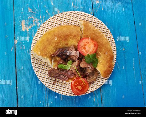 Greek roast lamb Stock Photo - Alamy