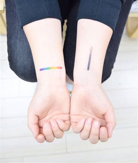 Gradient line tattoos on the wrists - Tattoogrid.net