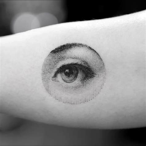 Incredibly realistic eye tattoo - Tattoogrid.net