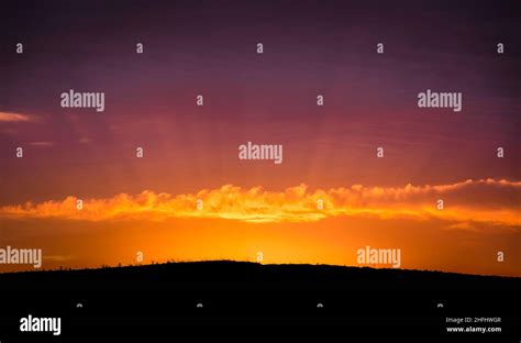 Cloudy Sunset sky Stock Photo - Alamy