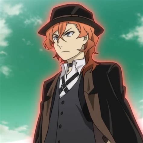 an anime character with red hair and a black hat standing in front of ...