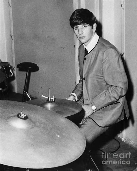 Musician Ringo Starr Playing Drums by Bettmann