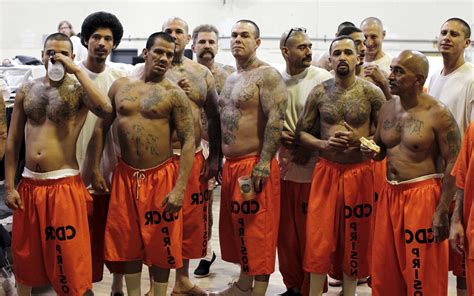 File photo of inmates standing in a gymnasium where they are housed due ...