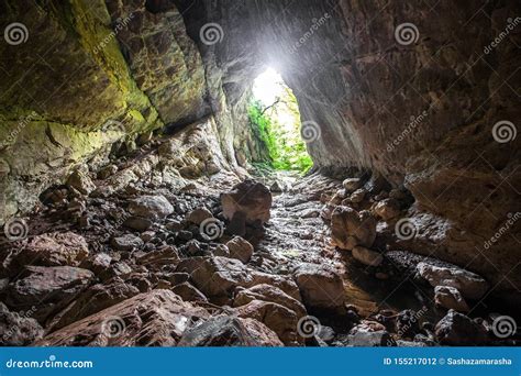 Stone Cave Inside View. Light Exit Stock Photo - Image of risk ...