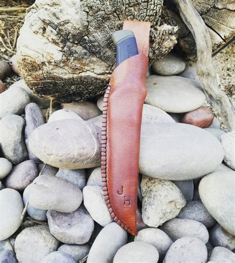 Items similar to Custom made Morakniv sheath with knife. on Etsy