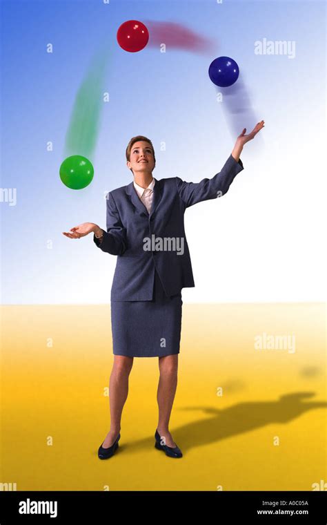 Woman juggling balls hi-res stock photography and images - Alamy