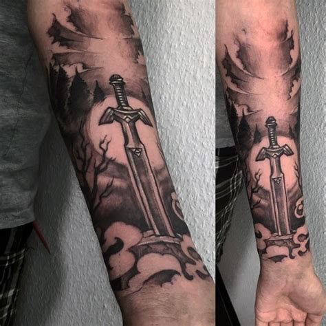 Cool designed and colored black and white mystic sword tattoo on arm ...