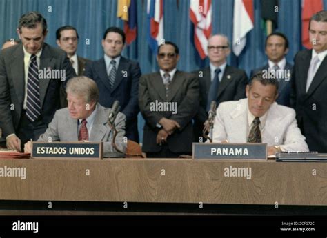 Jimmy Carter and Omar Torrijos signing the Panama Canal Treaty. ca. 06 ...