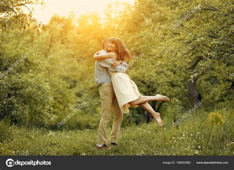 Happy Couple Hugging Summer Park Sunset — Stock Photo © kozirsky #198922882