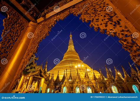 Golden Shwedagon Pagoda at Night with Twilight Sky through the Door ...