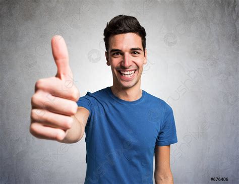 Happy smiling man giving thumbs up - stock photo 676406 | Crushpixel