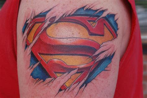 Colorful-Ripped-Skin-Superman-Logo-Tattoo-Design-For-Shoulder ...