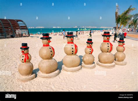 Snowman on the beach, Dubai, Jumeirah Beach Residence Stock Photo - Alamy