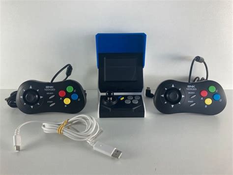 Neo Geo Neo Geo Mini Console With 2 Controllers - Video - Catawiki