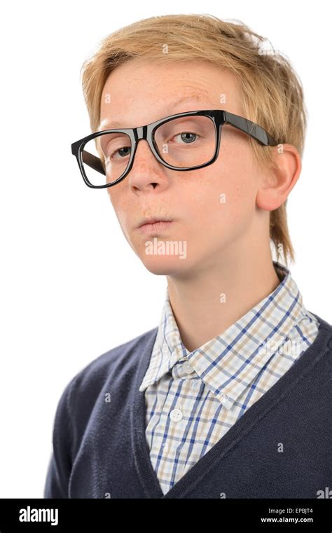 Serious teenage nerd boy wearing geek glasses Stock Photo - Alamy