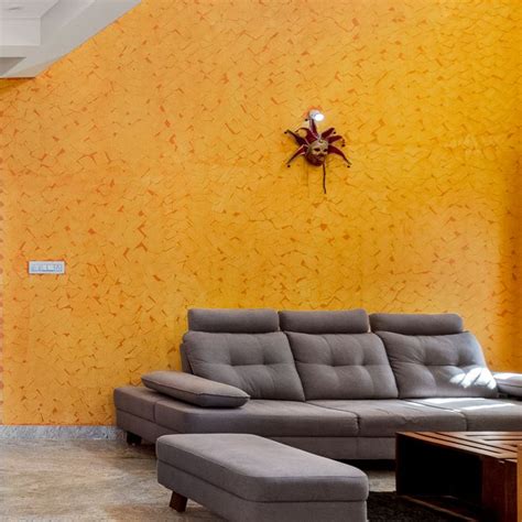 Warm-Toned Wall Colour Combination For Living Room | Livspace