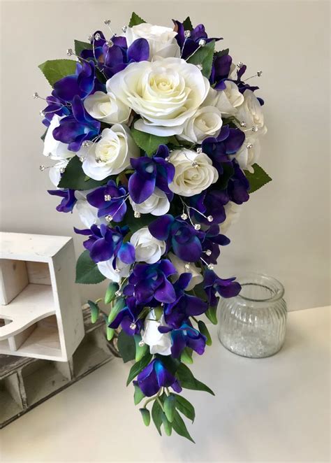 Blue orchids white roses diamanté’s teardrop bouquet | Orchid wedding ...