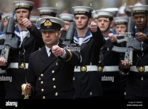 London, UK. 17th April, 2013. Royal Navy sailors march before the ...