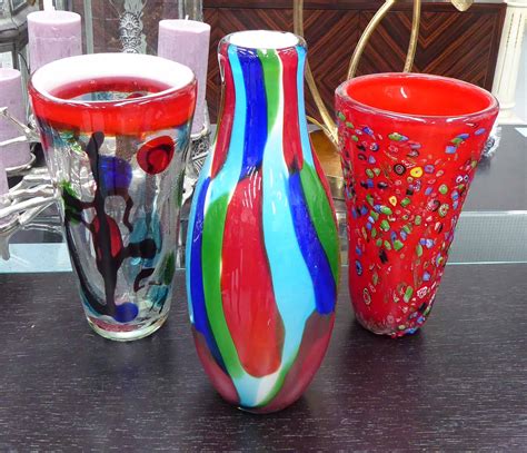 MURANO STYLE GLASS VASES, a collection of three, 40cm highest. (3)