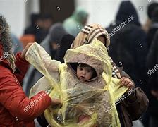 Image result for Mother Protecting Child Rain