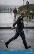 Image result for Man Walking in the Rain Sideways